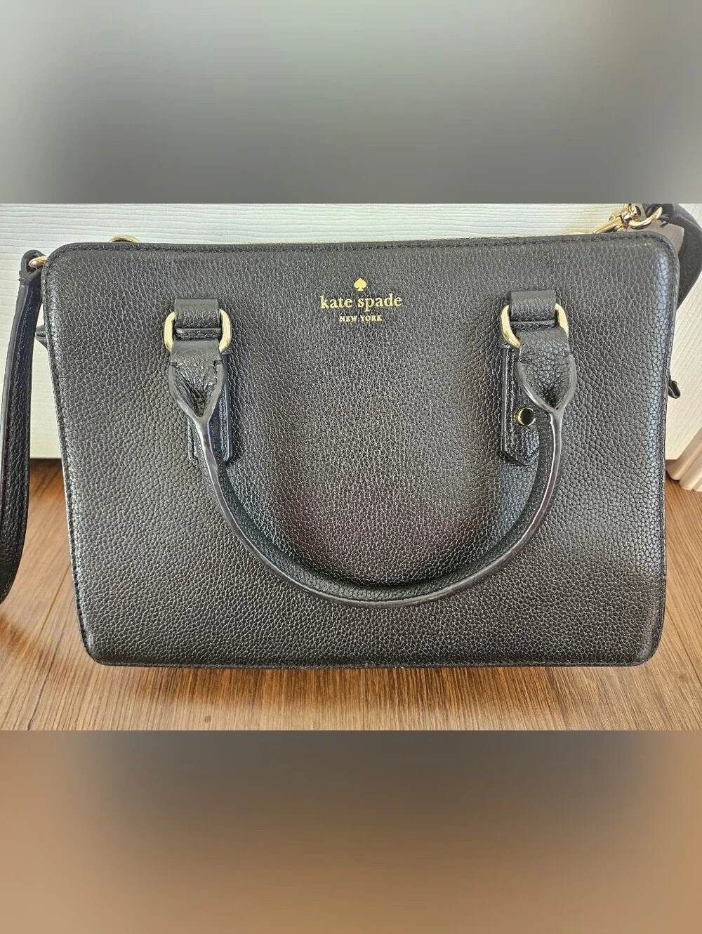 kate spade black pebbled leather satchel with gold accents